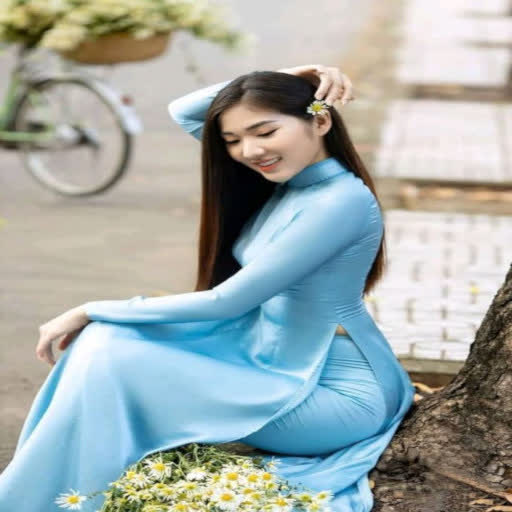 thoi trang ao dai satin xanh